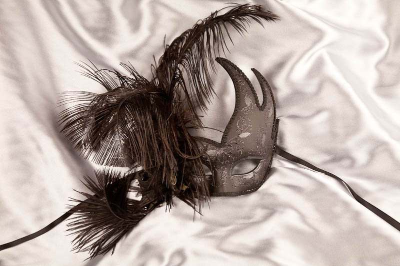 Jet black feather Venetian mask for women