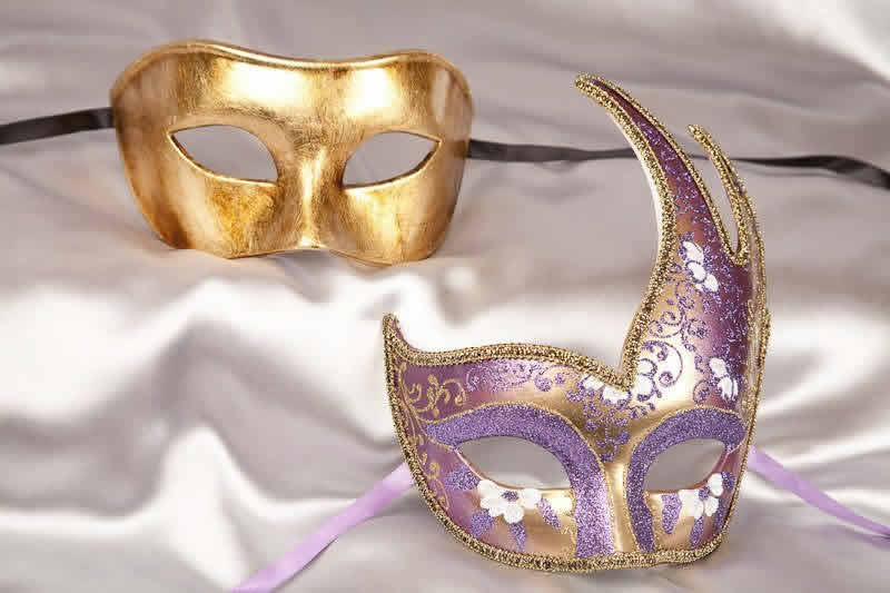 couples masquerade masks purple gold