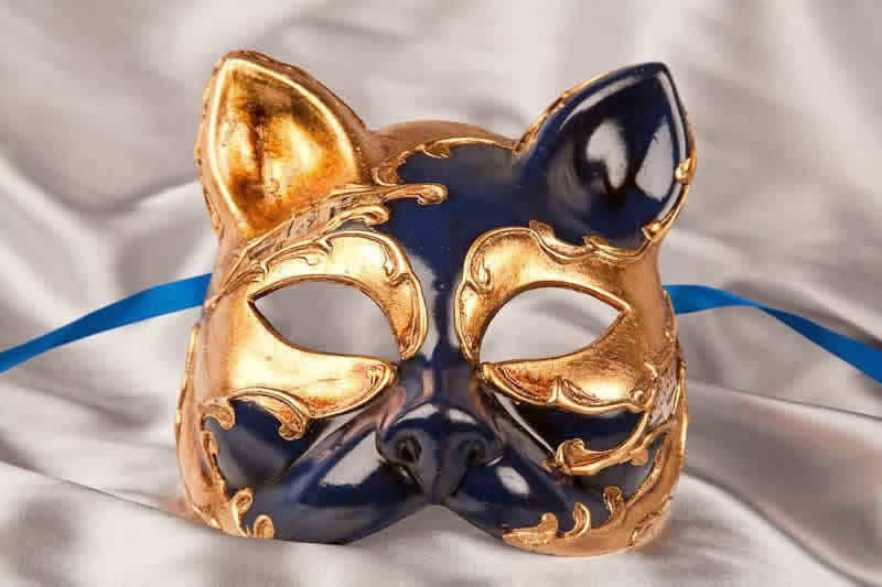 enetian cat mask with musical notes and gold leaf in blue