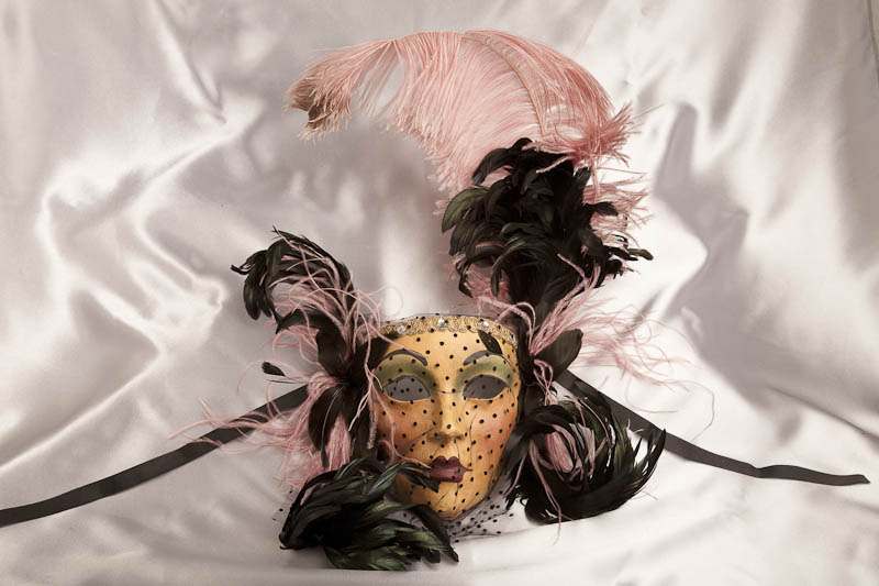 Decorative wall mask in pink and black