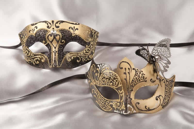 Pair of black and gold masquerade masks with butterfly | Tomboy Teresa