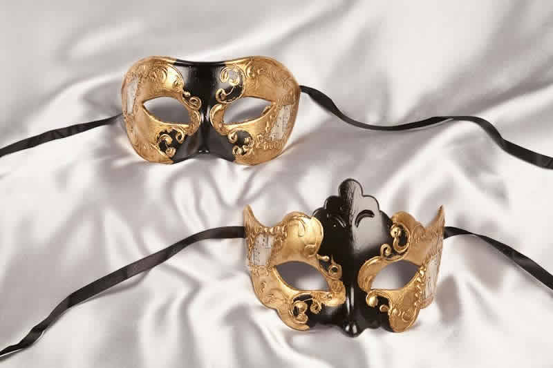 black and gold pair of masks
