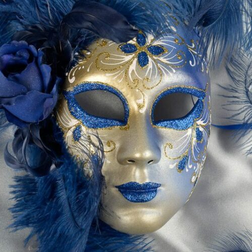 Blue wall mask with feathers close up