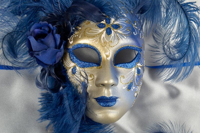 Blue wall mask with feathers close up
