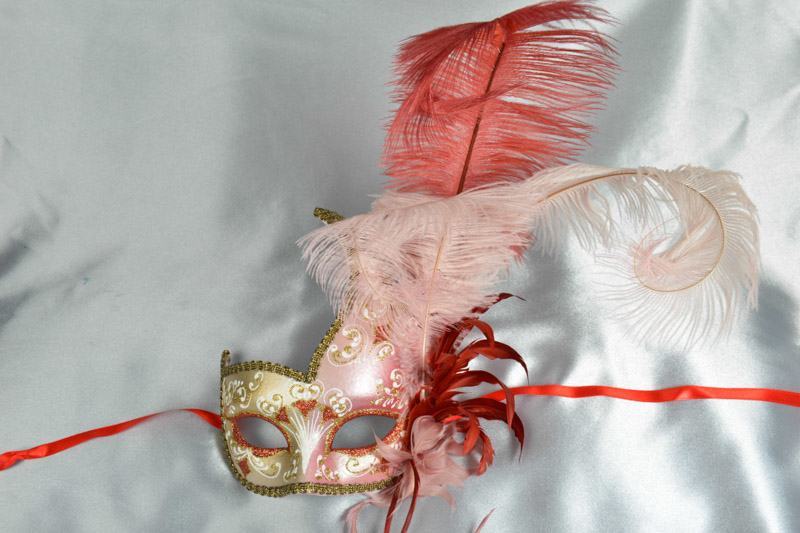 Two colour gold trim feathered ball mask for ladies in red