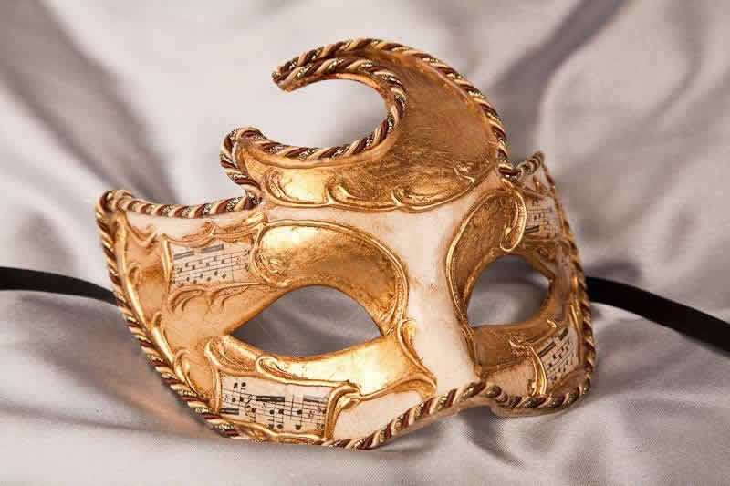 Moon shaped masquerade mask in gold and cream