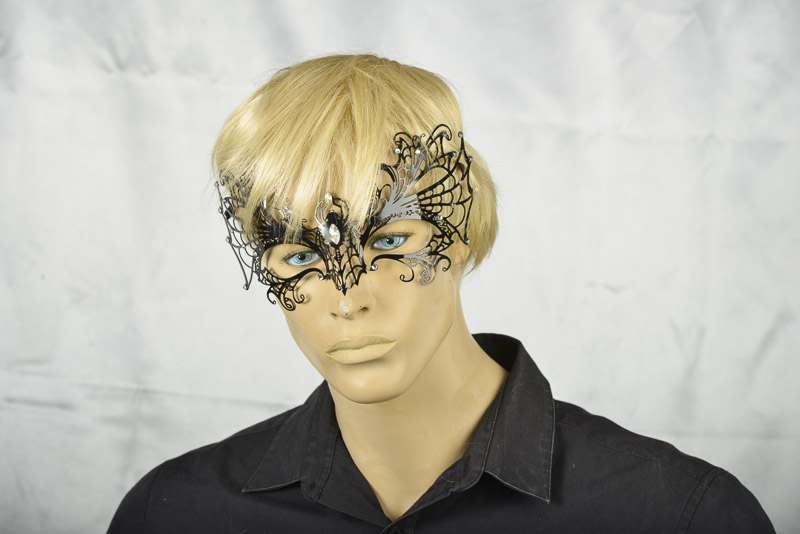 Black filigree metal Spider Venetian Masks on male face
