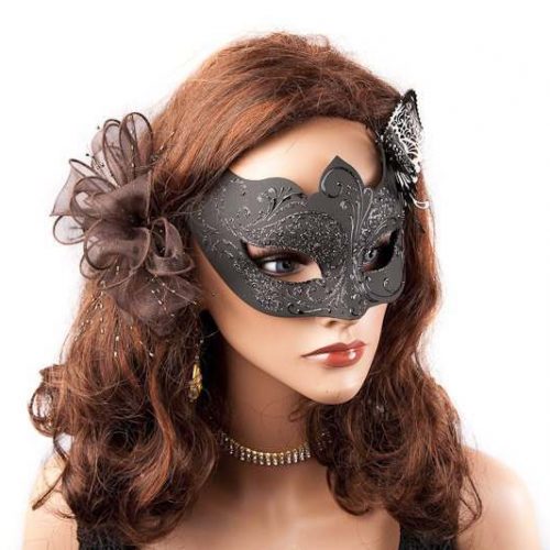 black butterfly masked ball mask on female face