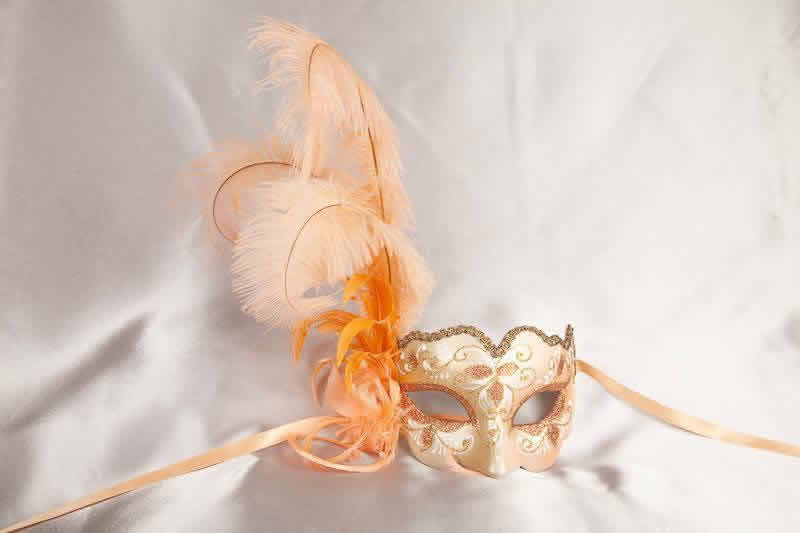 peach and gold feathered mask