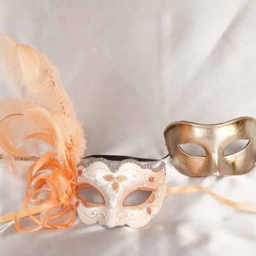 two peach silver masquerade masks