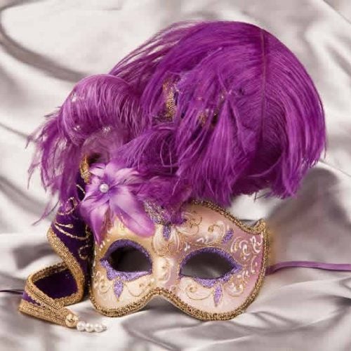 Gold trim Venetian jolly mask with feathers and jester bells in Purple