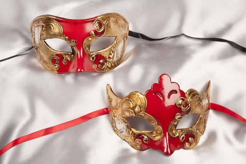 red and gold pair of masks