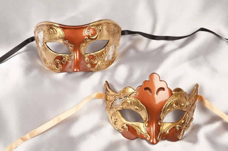 rust and gold pair of masks