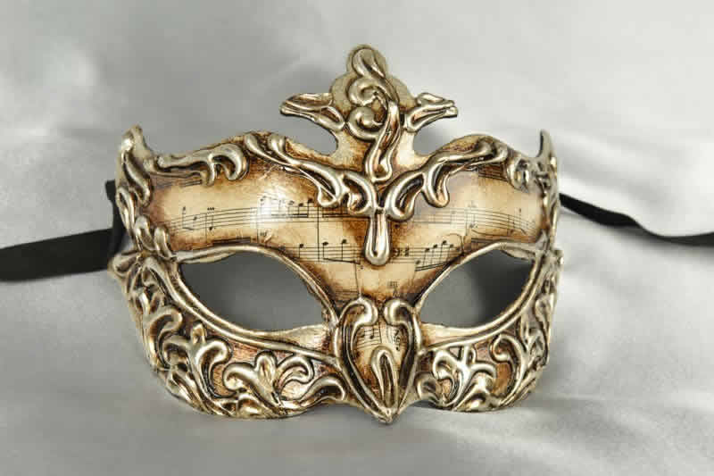 silver paper mache mask with musical notes