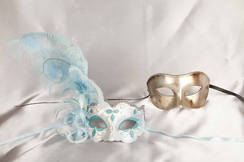 two turquoise silver masquerade masks