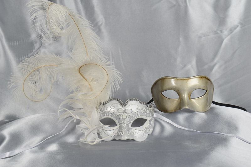 two white silver masquerade masks