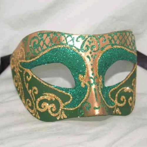 Carnival masquerade mask in gold and green