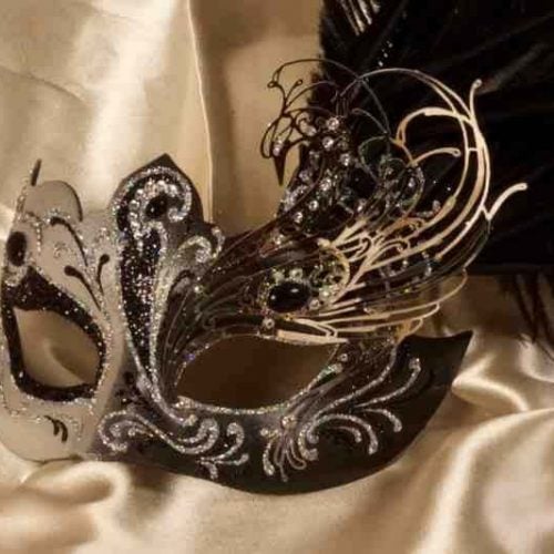 black and silver Custom Venetian mask with fretwork and feathers close up