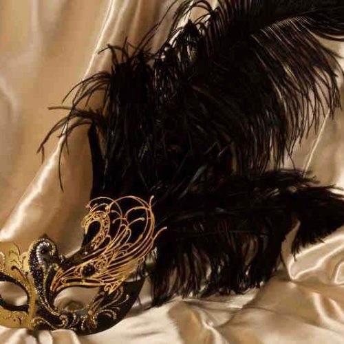 Paper mache Venetian mask with filigree detail and luxury tall feathers in gold and black