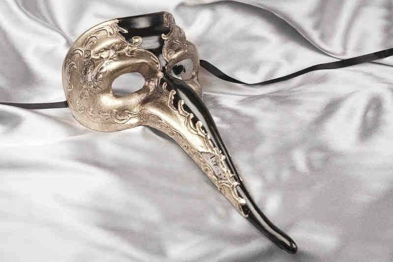 mans long nose masquerade mask in black and silver