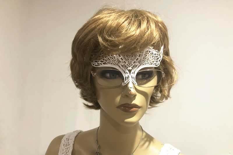 masquerade mask designed to be worn with glasses shown on female model