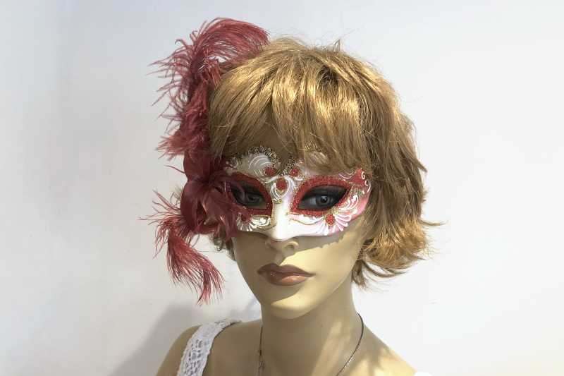 baby piuma small masquerade mask with feathers on female model face