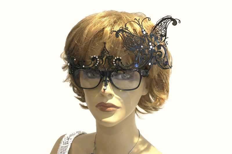 mask attached to glasses on female model - carina