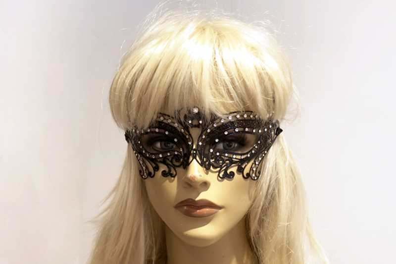 black luxury ball mask for women on female model face