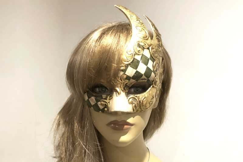 Swan Shaped Masquerade Mask with diamond pattern on female face
