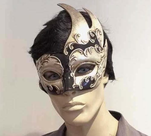 swan shaped animal masquerade mask in black and silver on male face