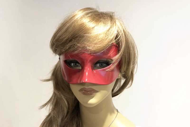 Colombina masquerade mask in red shown on female face