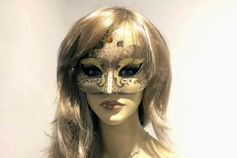 Farfallina Gold Womens masquerade mask on female face