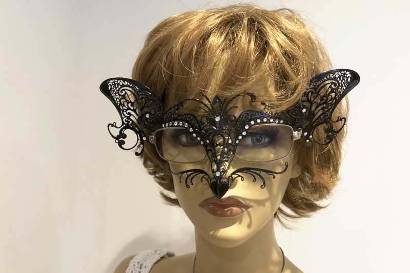 Cat mask for glasses wearers attached to womans spectacles