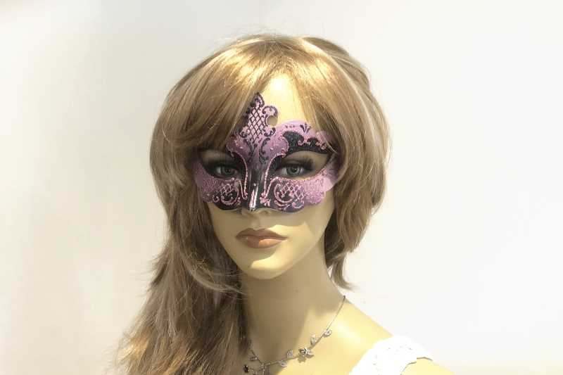 Black and Pink small carnival masquerade mask on female face