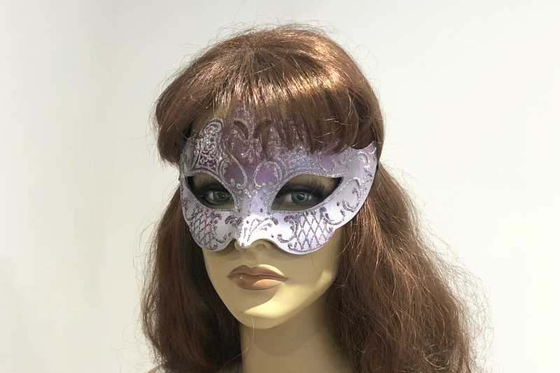 Tiara shaped masquerade mask in silver shown on female face