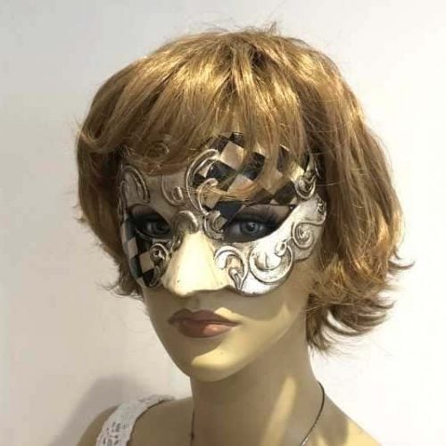 Carnvial masquerade mask with black and white diamond checks on female face