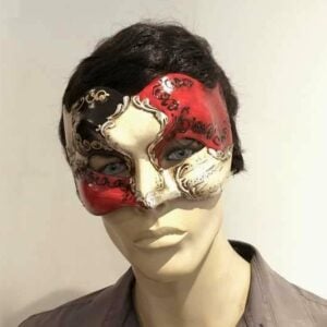 Joker Vivaldi masquerade beak mask on male face