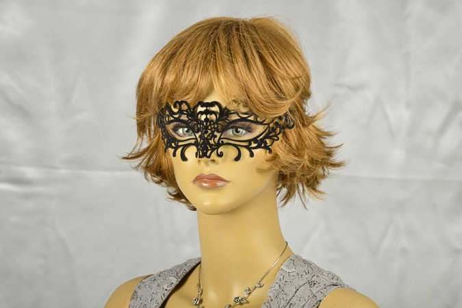 Black velvet lace masquerade mask on female face