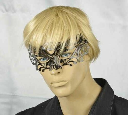 Laser cut metal masquerade mask Uomo on male face