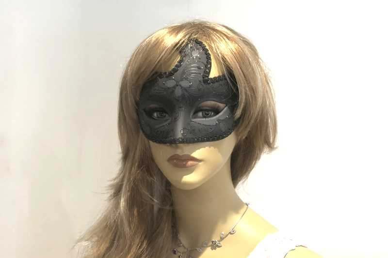 Moon shaped black masquerade mask Mezza Fiore on female face