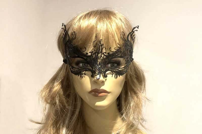 Rugiada filigree metal mask on female face