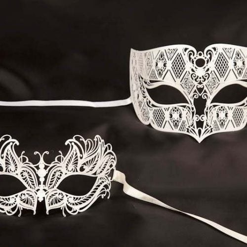 white pair of fretwork Venetian masks Tomboy Petal