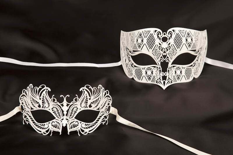 white pair of fretwork Venetian masks Tomboy Petal