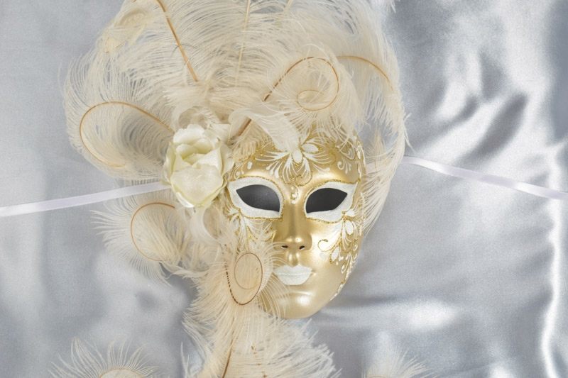 White and Gold full face wall mask with feather surround close up